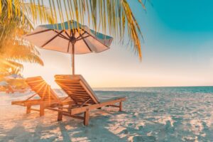 a beach and sun loungers